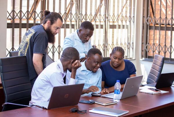 Researchers at a computer